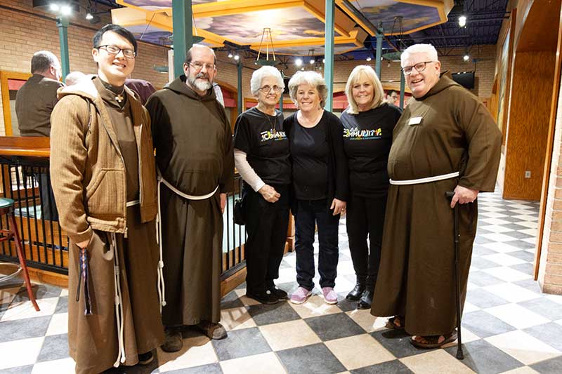 Photograph of friars and volunteers at the 2023 Bocce with the Brothers event